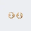 Bold metallic earrings, bronze