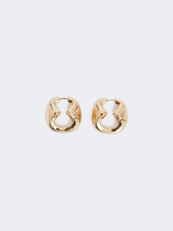 Bold metallic earrings, bronze