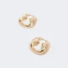 Bold metallic earrings, bronze