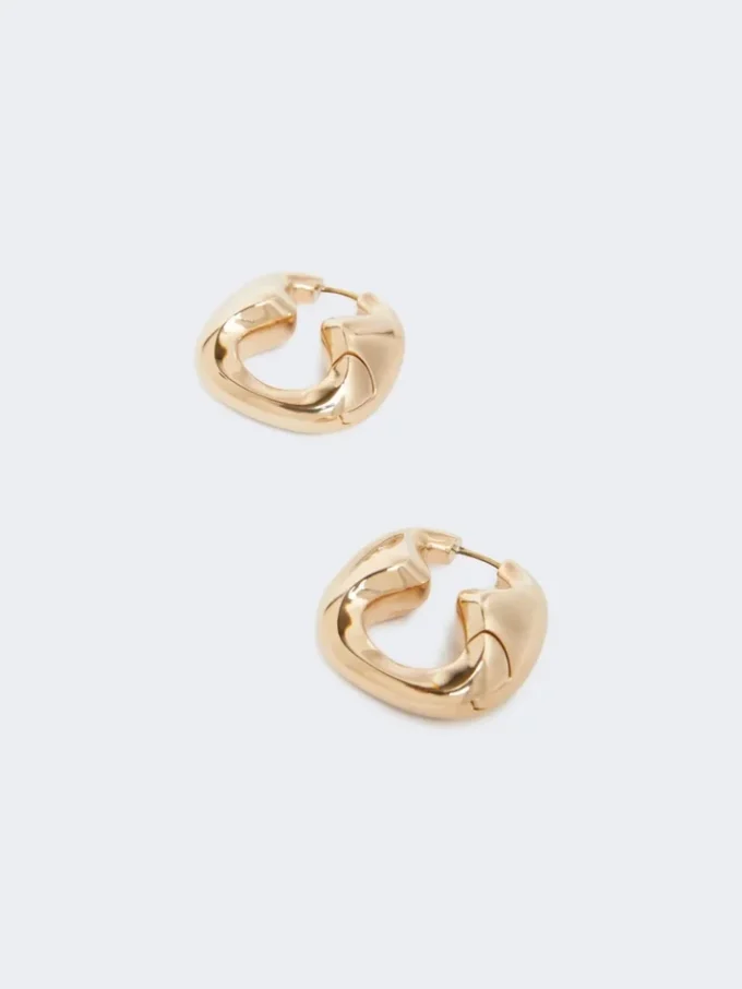 Bold metallic earrings, bronze