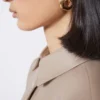 Bold metallic earrings, bronze