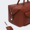Large leather boston bag with pockets, rust