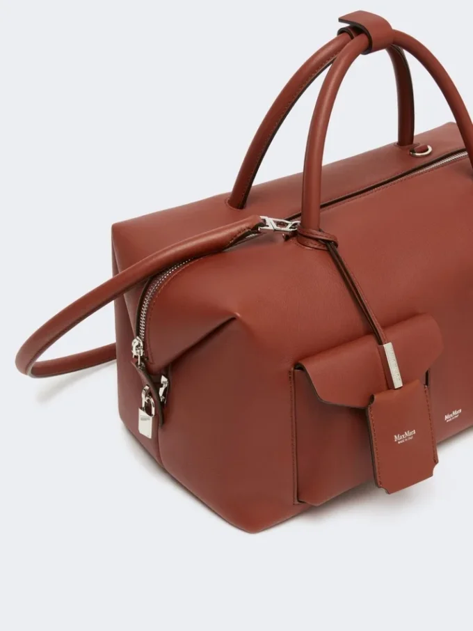 Large leather boston bag with pockets, rust