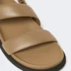 Leather sandals, mud