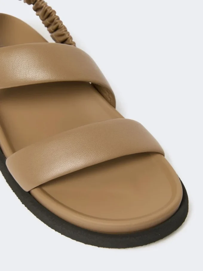 Leather sandals, mud