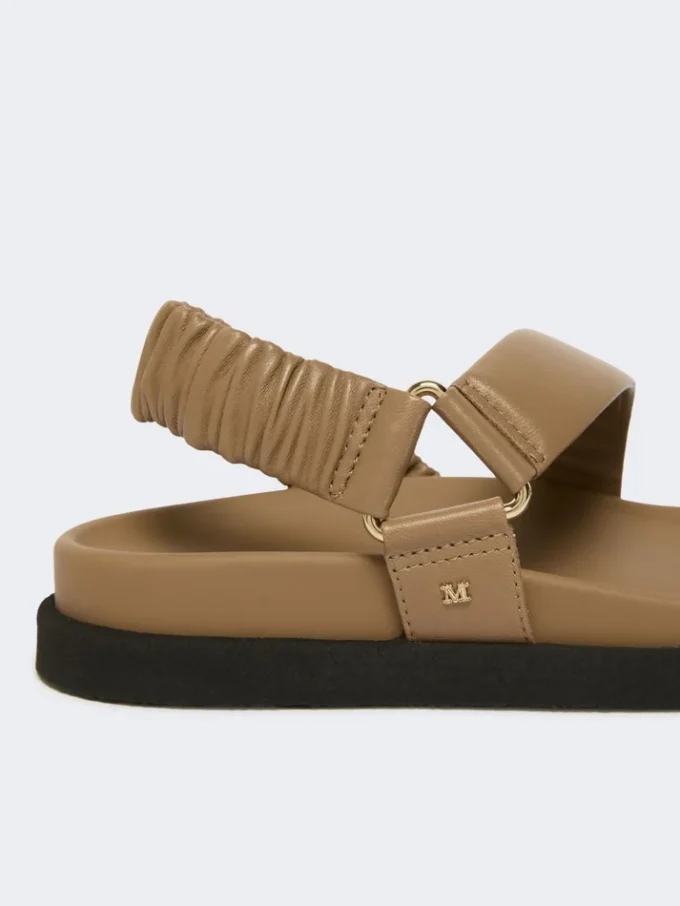 Leather sandals, mud