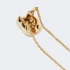 Long necklace with pasticcino bag charm, gold Long necklace with pasticcino bag charm, gold