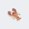 Metal brooch with rhinestones, dark red Metal brooch with rhinestones, dark red