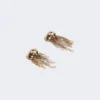Metallic earrings, gold
