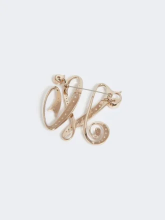 Monogram brooch with rhinestones, ivory
