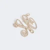 Monogram brooch with rhinestones, ivory