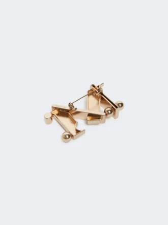Monogram metal brooch, gold