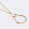 Necklace with monogram pendant, gold