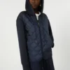 Padded, hooded jacket in water-repellent canvas and jersey, navy Padded, hooded jacket in water-repellent canvas and jersey, navy