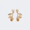 Set with charms and crystals, gold