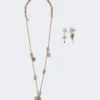Set with flower and crystal details, gold