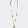Set with flower and crystal details, gold