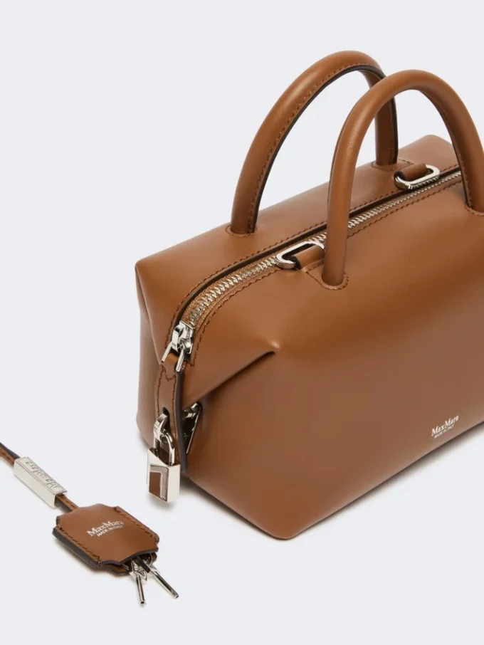 Small natural leather bowler bag, amber brown