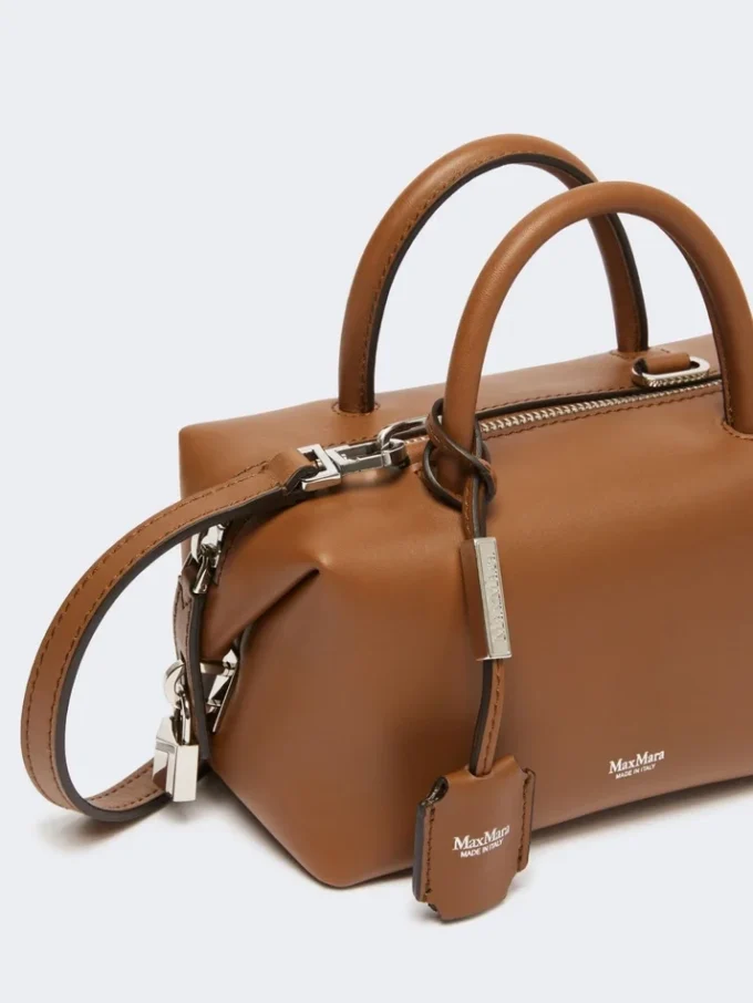 Small natural leather bowler bag, amber brown
