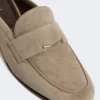 Suede mules, mud